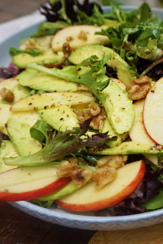 Apple, avocado, walnuts salad with lemon-mustard dressing