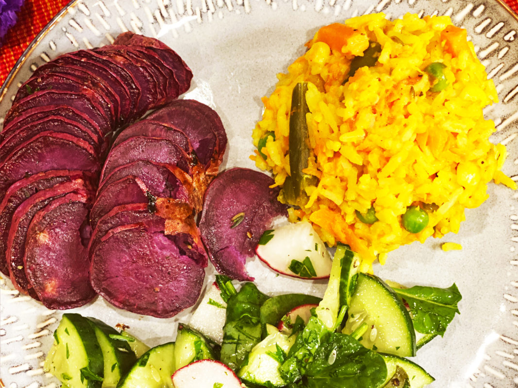 organic Purple Stokes sweet potato—Hasselback style with salad and rice